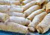 Descoperă cum să prepari cornulețe fragede și aromate, umplute cu nucă și acoperite cu un strat subțire de zahăr pudră