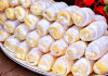 Descoperă o rețetă ușoară pentru rulouri delicioase cu smântână și umplutură de nucă, perfecte pentru un desert rapid